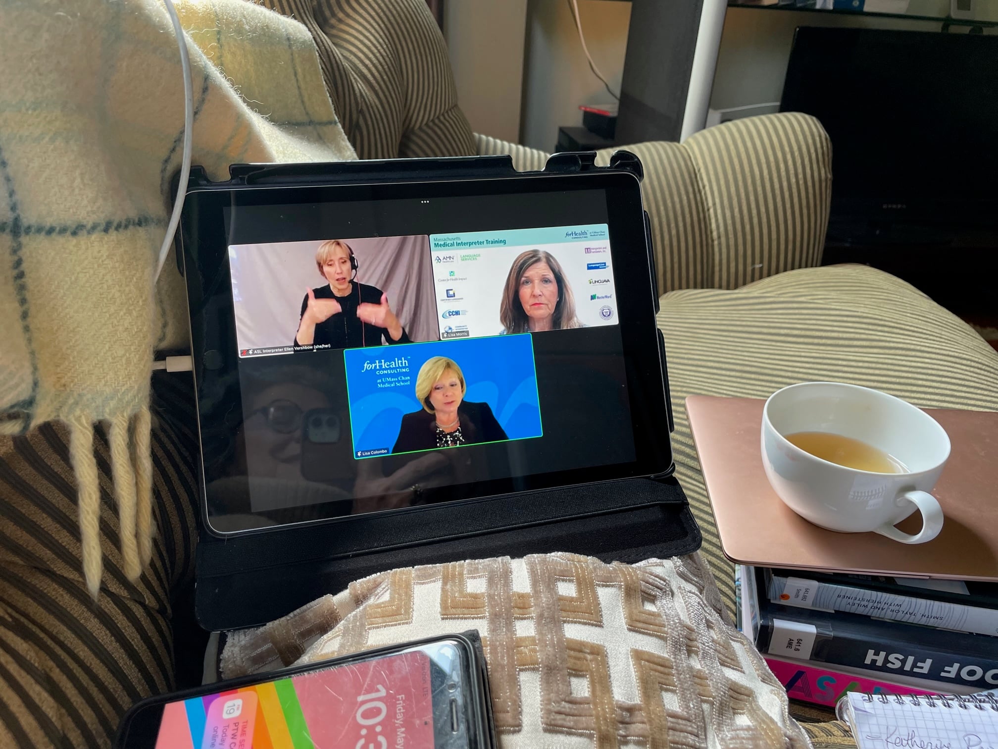 On laptop screen: ASL interpreter for the event; Lisa Morris and Lisa Colombo