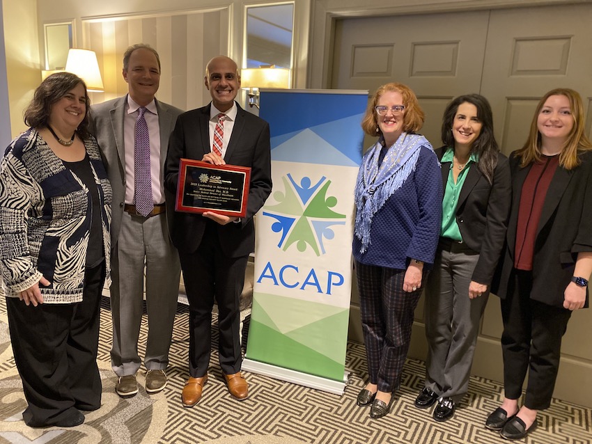 Photo courtesy the Association for Community Affiliated Plans (ACAP). Pictured from left to right: Mara Youdelman, managing attorney at the National Health Law Program; Ken Preede, vice president for government relations, Commonwealth Care Alliance; Mohammad Dar, MD, senior medical director of Massachusetts Medicaid (MassHealth) and chair of the National Medicaid Medical Directors Network; Meg Murray, founding CEO of the Association for Community Affiliated Plans (ACAP); Elizabeth Goodman, chief legal and public affairs officer, Commonwealth Care Alliance; and Madalyn News, MPH, Medicaid program associate, ACAP.